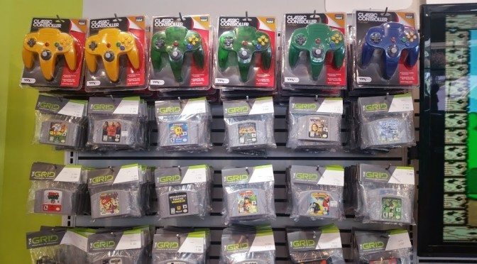 Wall of video games and controllers at The Grid Charlotte